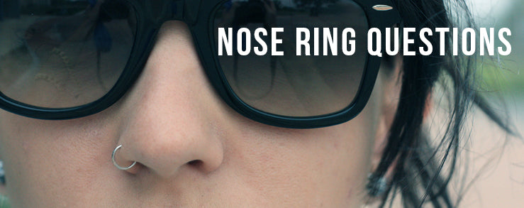 Person in dark sunglasses with a small silver-tone nostril hoop, with the words Nose Ring Questions
