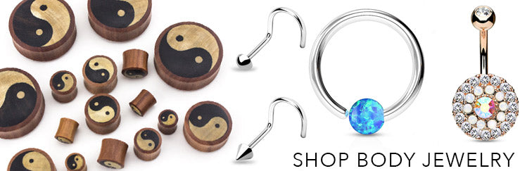 Yin yang wood plugs, nose screws, a captive bead ring and a crystal belly button ring, labeled Shop Body Jewelry