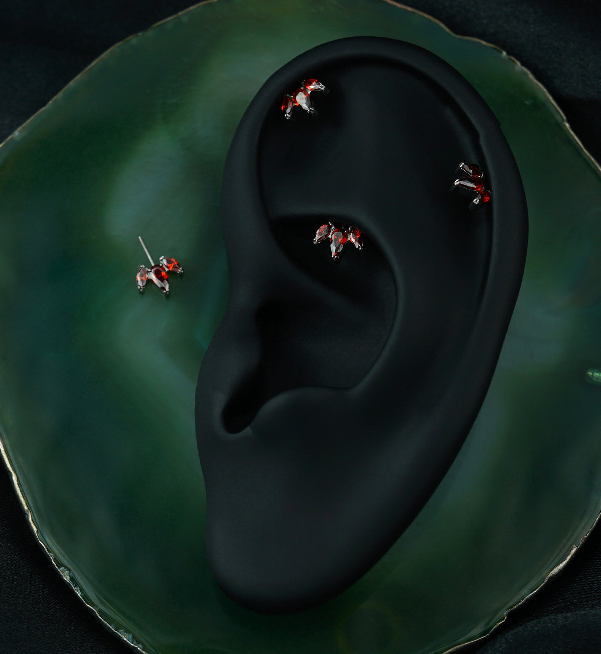 Tri-Sepal Red CZ Vertical Titanium Threadless Top
