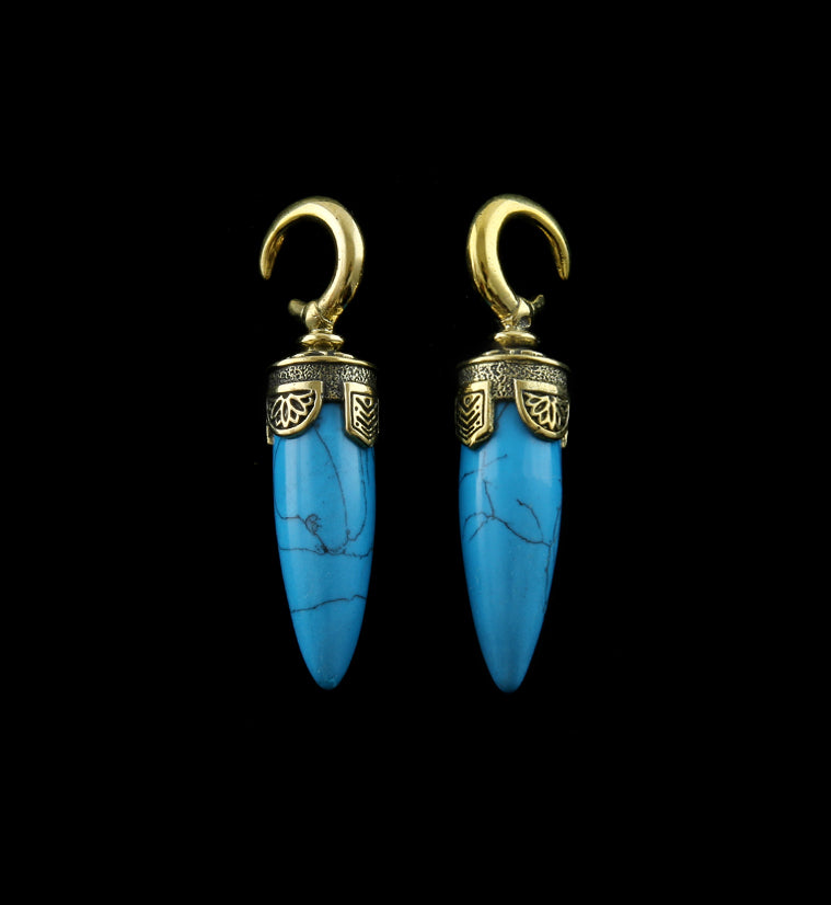 Sold in pairs (2pc) 8G or bigger to wear Height: 55mm Width: 12mm 9 grams each Howlite stone Made of brass Brass is not meant for long term wear May oxidize under extreme moisture conditions